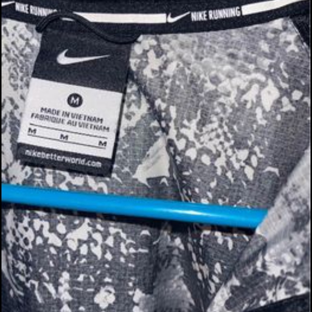 Thin NIKE wind jacket. New without tags.